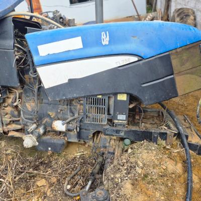 LOTE CONTENDO  TRATOR NEW HOLLAND DESMONTADO, NO ESTADO EM QUE SE ENCONTRA.