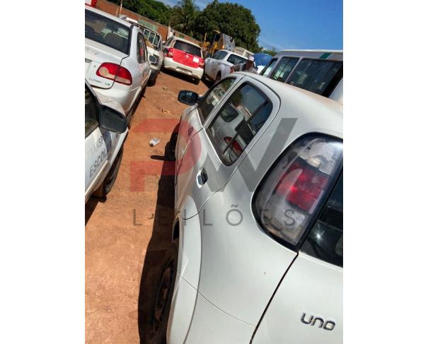 Foto de PAS/AUTOMOVEL FIAT/UNO ATTRACTIVE 1.0, ALCOOL/GASOLINA, ANO/MOD 2020/2021, COR BRANCA, NO ESTADO EM QUE SE ENCONTRA.