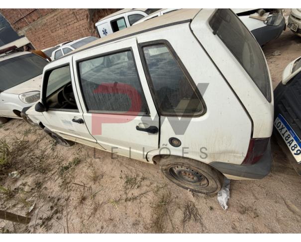 Foto de AUTOMOVEL FIAT/UNO MILLE ECONOMY, ALCOOL/GASOLINA, BRANCA, 2010/2011, CHASSI: 9BD15822AB6511899, RENAVAM: 00258635550, NO ESTADO EM QUE SE ENCONTRA.