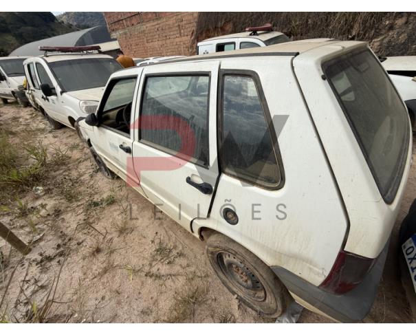 Foto de AUTOMOVEL FIAT/UNO MILLE ECONOMY, ALCOOL/GASOLINA, BRANCA, 2010/2011, CHASSI: 9BD15822AB6511899, RENAVAM: 00258635550, NO ESTADO EM QUE SE ENCONTRA.