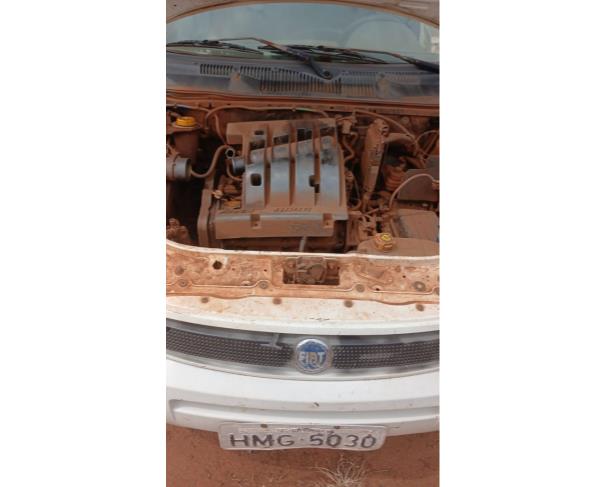 Foto de AUTOMOVEL, FIAT/PALIO WEEK ELX FLEX, BRANCA, 2005/2006, ALCOOL/GASOLINA, CHASSI: 9BD17301A64157180, RENAVAM: 00865324204, NO ESTADO EM QUE SE ENCONTRA.
