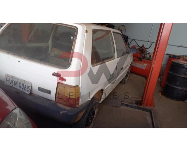 Foto de PASSAGEIRO / AUTOMOVEL FIAT/UNO MILLE FIRE, 2002/2003, GASOL, BRANCA, PLACA HAM - 0065, RENAVAM: 792507614, CHASSI: 9BD15802534435918. NO ESTADO EM QUE SE ENCONTRA. 