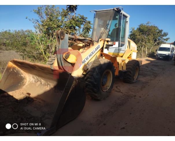 Foto de PÁ CARREGADEIRA NEW HOLLAND W130ZB - CHASSI: HBZNW130VDAE04408, ANO 2013/2013, PLACA FICTICIA: PAC-1303, NO ESTADO EM QUE SE ENCONTRA.