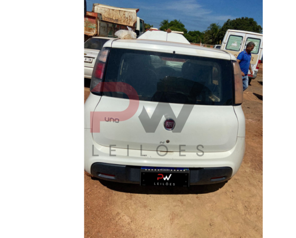 Foto de PAS/AUTOMOVEL FIAT/UNO ATTRACTIVE 1.0, ALCOOL/GASOLINA, ANO/MOD 2020/2021, COR BRANCA, NO ESTADO EM QUE SE ENCONTRA.
