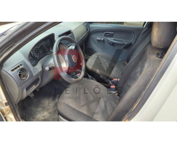 Foto de PASSAGEIRO / AUTOMOVEL FIAT/PALIO FIRE, ALCOOL/GASOLINA, BRANCA, 2016/2016, PLACA PYB-0J68, CHASSI: 9BD17122ZG7579733, RENAVAM: 01091231858, NO ESTADO EM QUE SE ENCONTRA. 