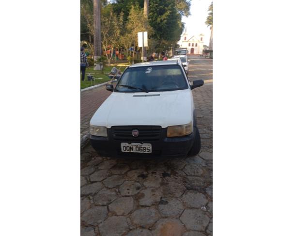 Foto de AUTOMOVEL FIAT/UNO MILLE WAY ECON, ALCOOL/GASOLINA, BRANCA, 2013/2013, CHASSI: 9BD15844AD6860476, RENAVAM: 00558896936, NO ESTADO EM QUE SE ENCONTRA.