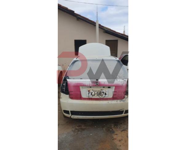 Foto de PASSAGEIRO / AUTOMOVEL FIAT/PALIO FIRE, ALCOOL/GASOLINA, BRANCA, 2015/2016, PLACA PXJ-9874, CHASSI: 9BD17122ZG7570402, RENAVAM: 01077846670, NO ESTADO EM QUE SE ENCONTRA. 