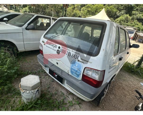 Foto de AUTOMOVEL FIAT/UNO MILLE ECONOMY, ALCOOL/GASOLINA, BRANCA, 2009/2010, CHASSI: ...93864, NO ESTADO EM QUE SE ENCONTRA.