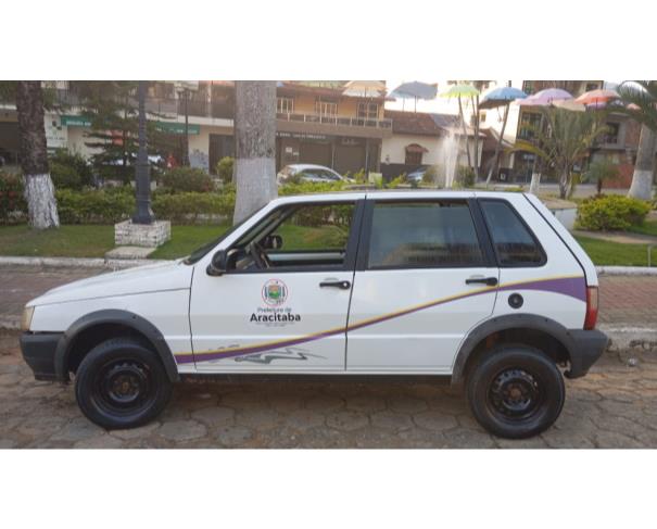 Foto de AUTOMOVEL FIAT/UNO MILLE WAY ECON, ALCOOL/GASOLINA, BRANCA, 2013/2013, CHASSI: 9BD15844AD6860476, RENAVAM: 00558896936, NO ESTADO EM QUE SE ENCONTRA.