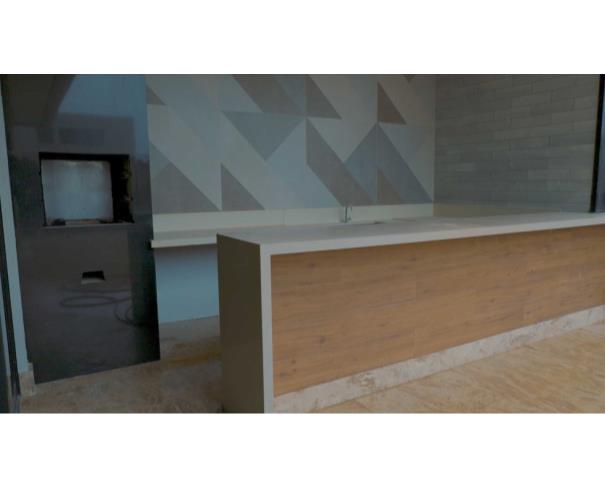 Foto de Residência de alto luxo no Condomínio Costa Laguna, em Nova Lima/MG, com 483 m², 4 dormitórios (3 suítes), piscina aquecida, espaço gourmet, cinema, automação residencial e 5 vagas cobertas. Condomínio com lazer completo e segurança 24 horas.