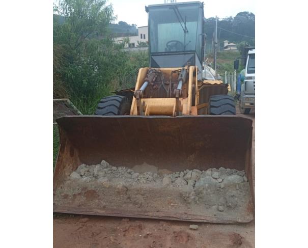 Foto de PÁ CARREGADEIRA NEW HOLLAND 12C, AMARELA, ANO: 2011, SÉRIE: NBAE00879, CHASSI: HBZN012CKBAE00879, NO ESTADO EM QUE SE ENCONTRA. 