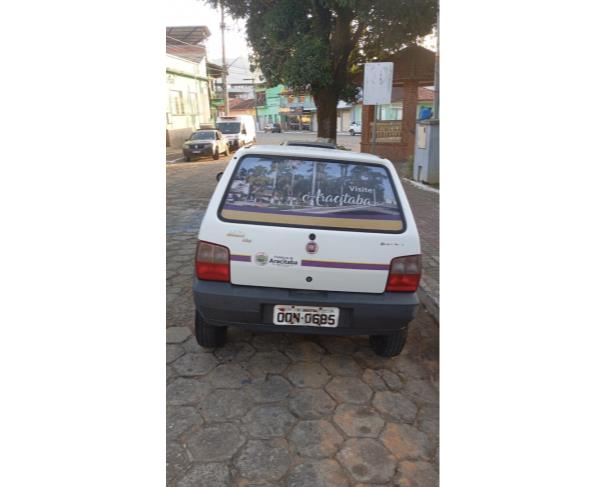 Foto de AUTOMOVEL FIAT/UNO MILLE WAY ECON, ALCOOL/GASOLINA, BRANCA, 2013/2013, CHASSI: 9BD15844AD6860476, RENAVAM: 00558896936, NO ESTADO EM QUE SE ENCONTRA.