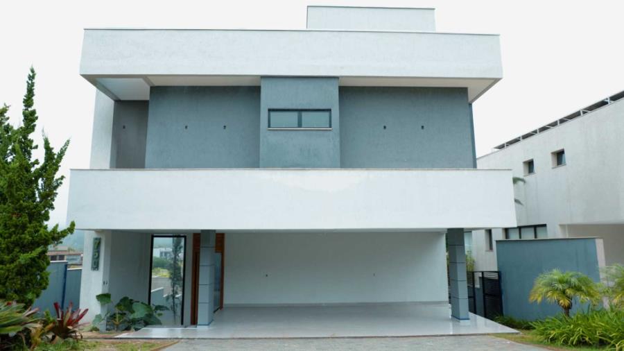 Imagem do imóvel Residência de alto luxo no Condomínio Costa Laguna, em Nova Lima/MG, com 483 m², 4 dormitórios (3 suítes), piscina aquecida, espaço gourmet, cinema, automação residencial e 5 vagas cobertas. Condomínio com lazer completo e segurança 24 hora